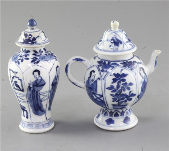 A Chinese blue and white vase and cover and a similar wine pot and cover, Kangxi period, height 12cm,